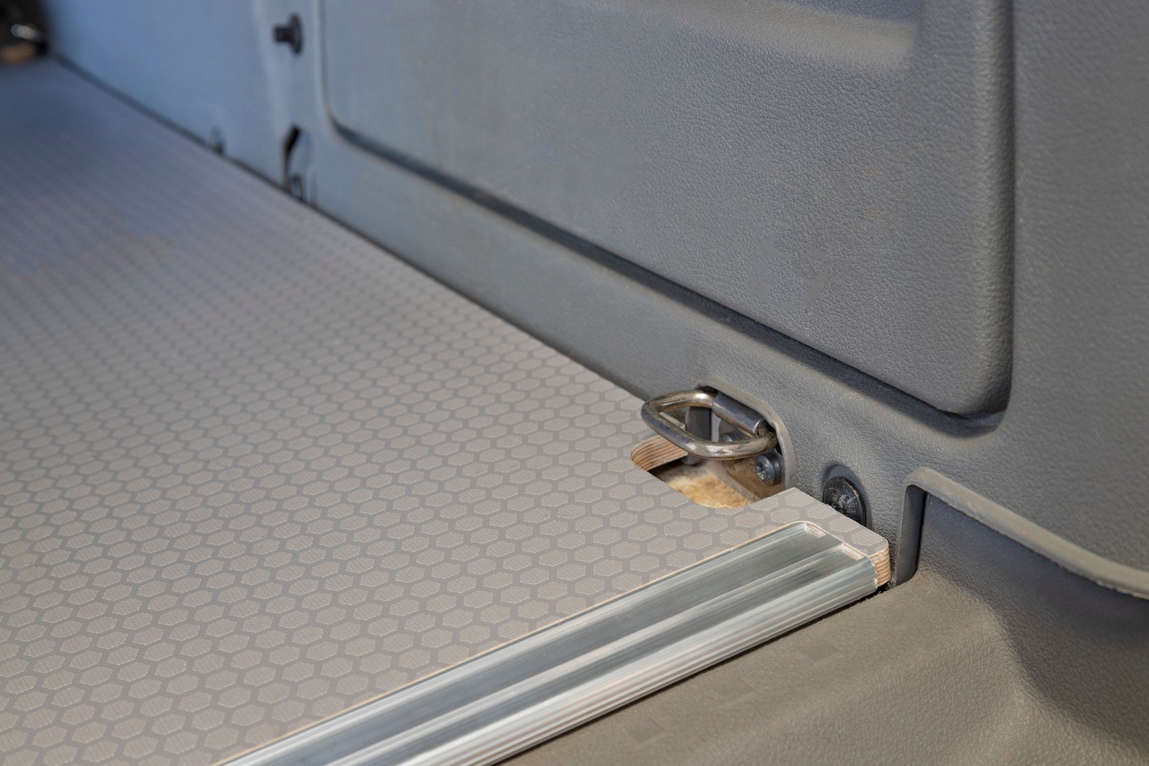 Vehicle interior with textured flooring